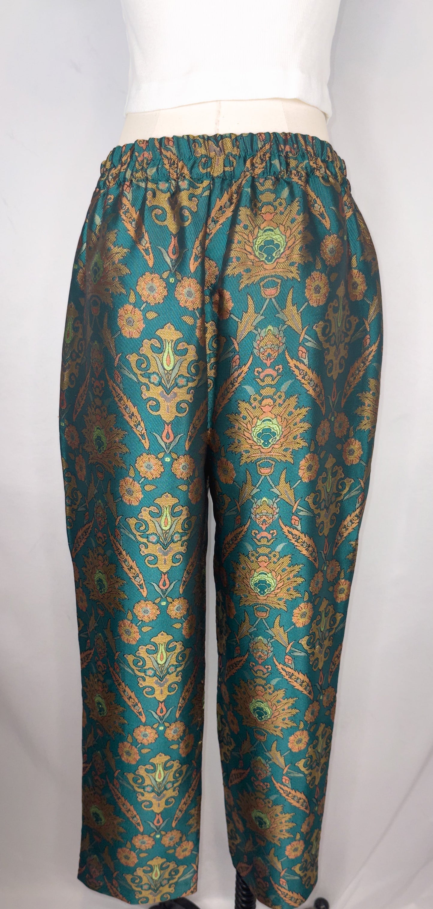 Back view of Maeve by Anthropologie Jacquard Trouser in Multi featuring the partly elastic waistband and the jacquard detailing.