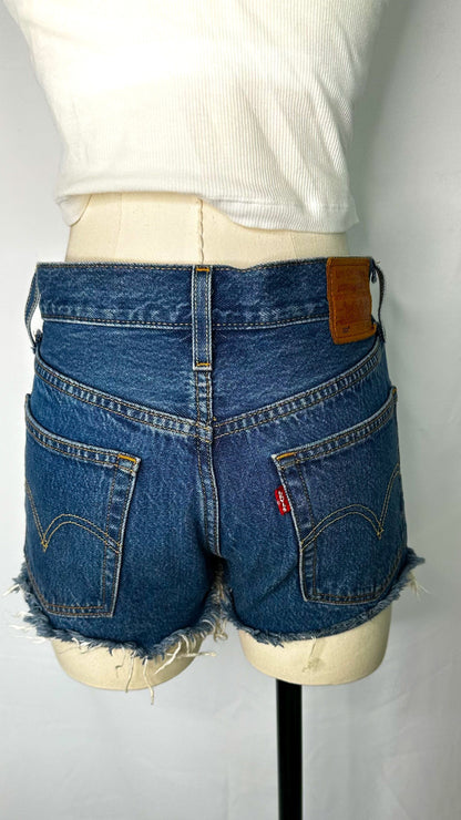 Back shot of Levis 501 High Rise Women’s Shorts in Dark Wash size 25, featuring the Levis tag brown leather tag and two back pockets.