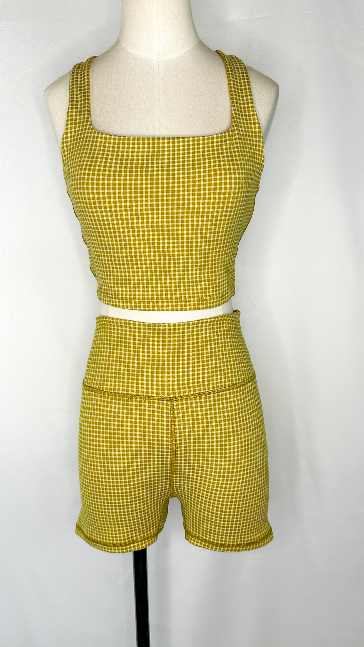 Front view of Madewell Flex High Rise Biker Shorts in Gingham Print and Citrus Lime Color