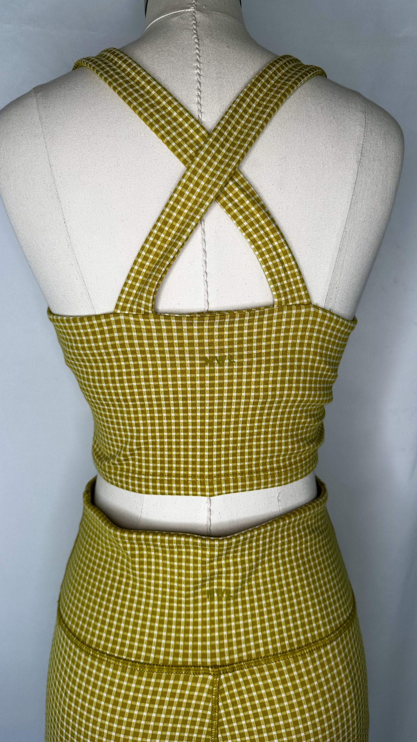 Back view of Madewell Flex Racerback Crop Tank Top in Gingham print and Citrus Lime color, featuring the MWL logo.