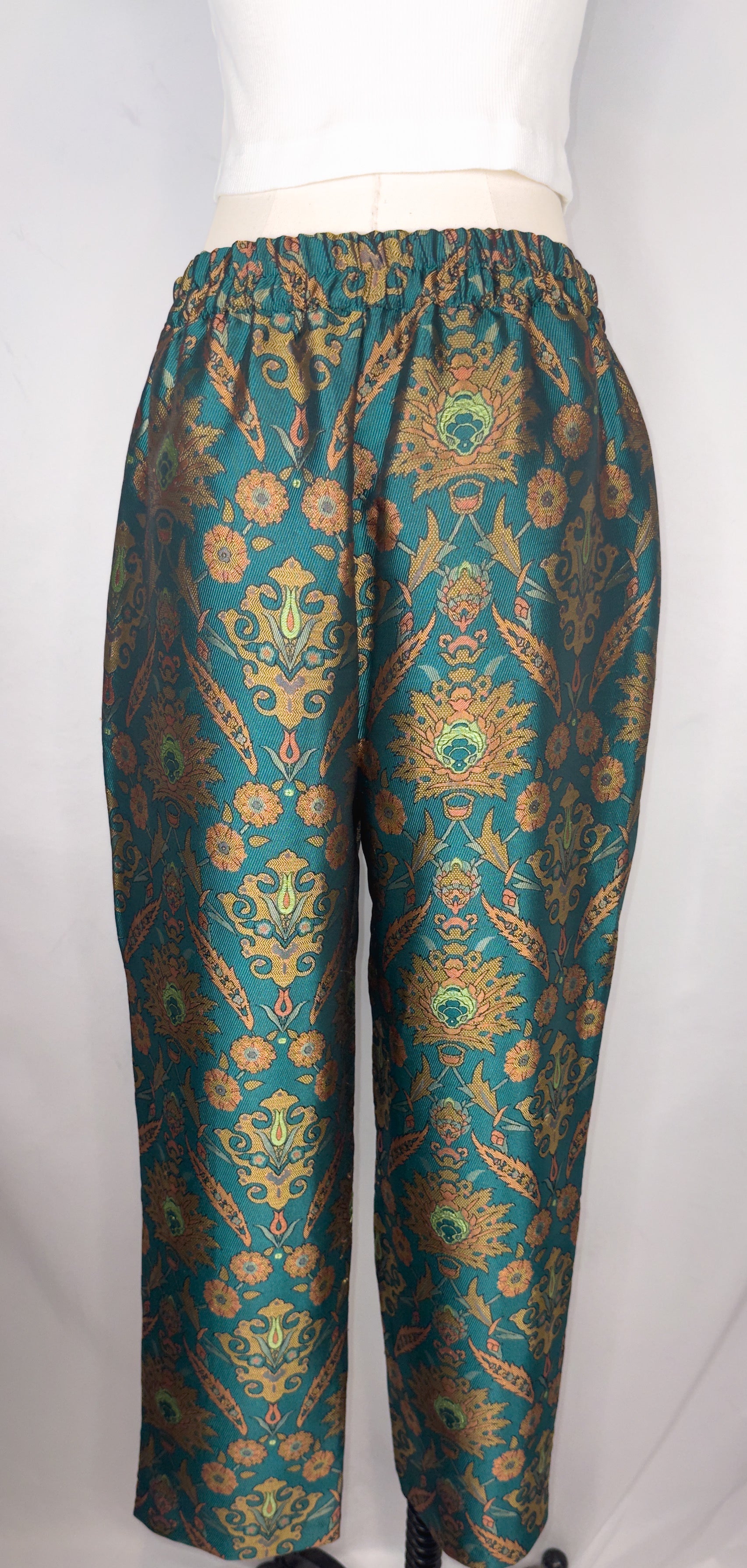 Back view of Maeve by Anthropologie Jacquard Trouser in Multi featuring the partly elastic waistband and the jacquard detailing.