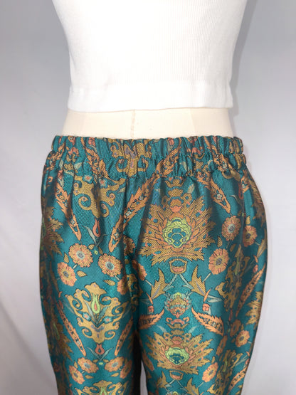 Up-close back view of Maeve by Anthropologie Jacquard Trouser in Multi, featuring the partly elastic waistband.