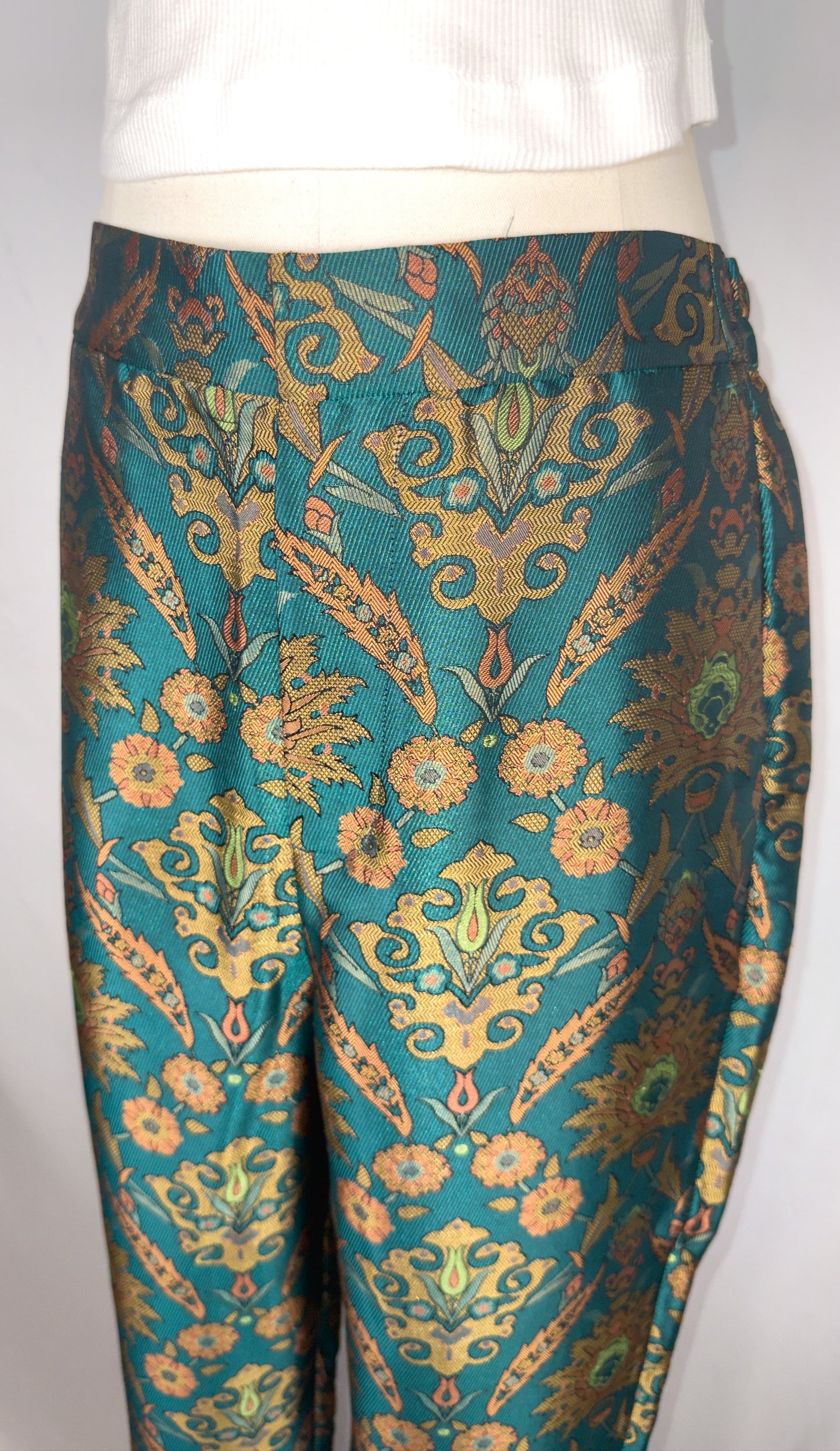 Up-close side angle of Maeve by Anthropologie Jacquard Trouser in Multi. Highlighting the discreet front closure and intricate jacquard detailing.  