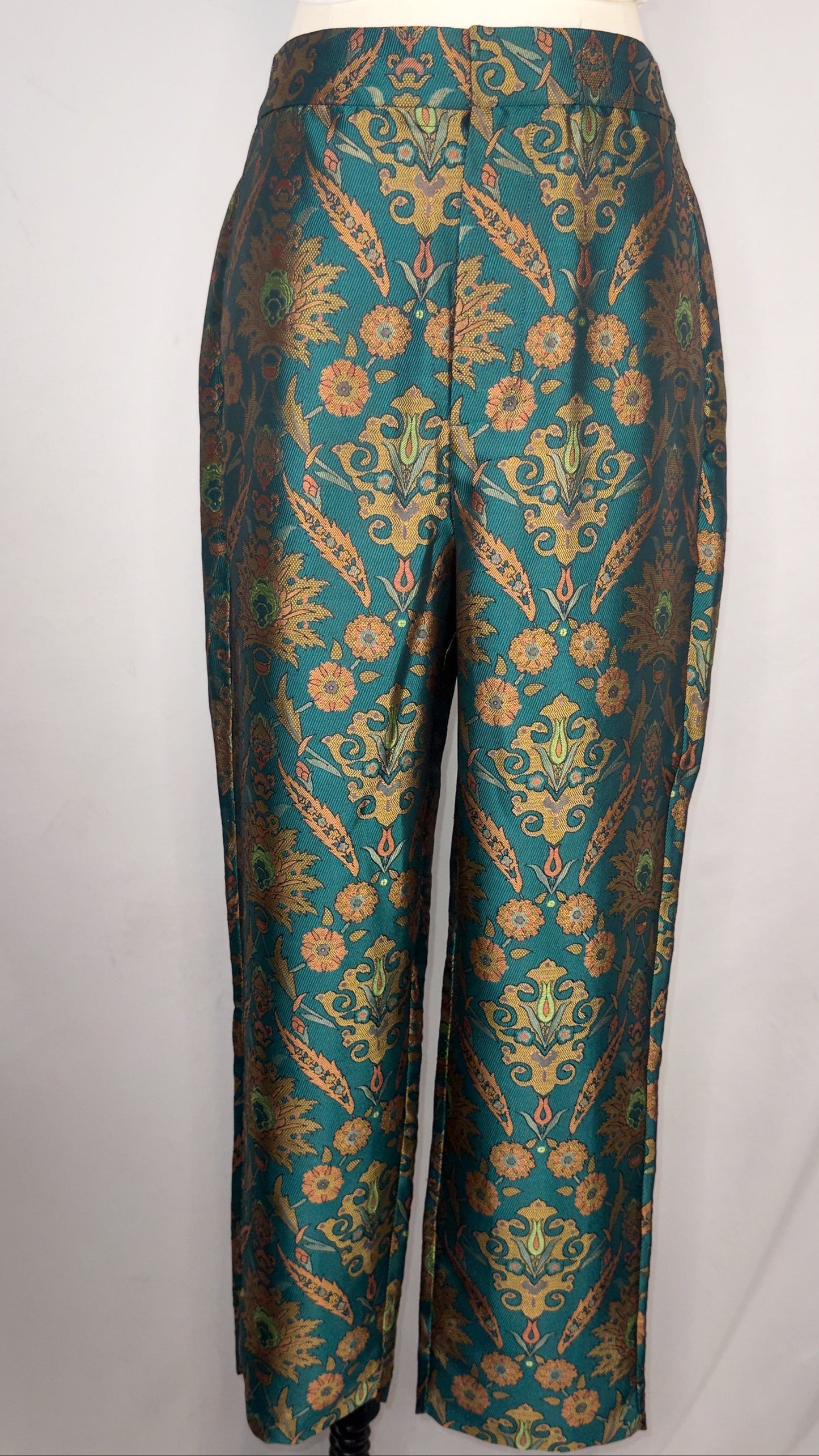 Up-close front facing view of Maeve by Anthropologie Jacquard Trouser in Multi. Featuring the beautiful multicolored stitching.