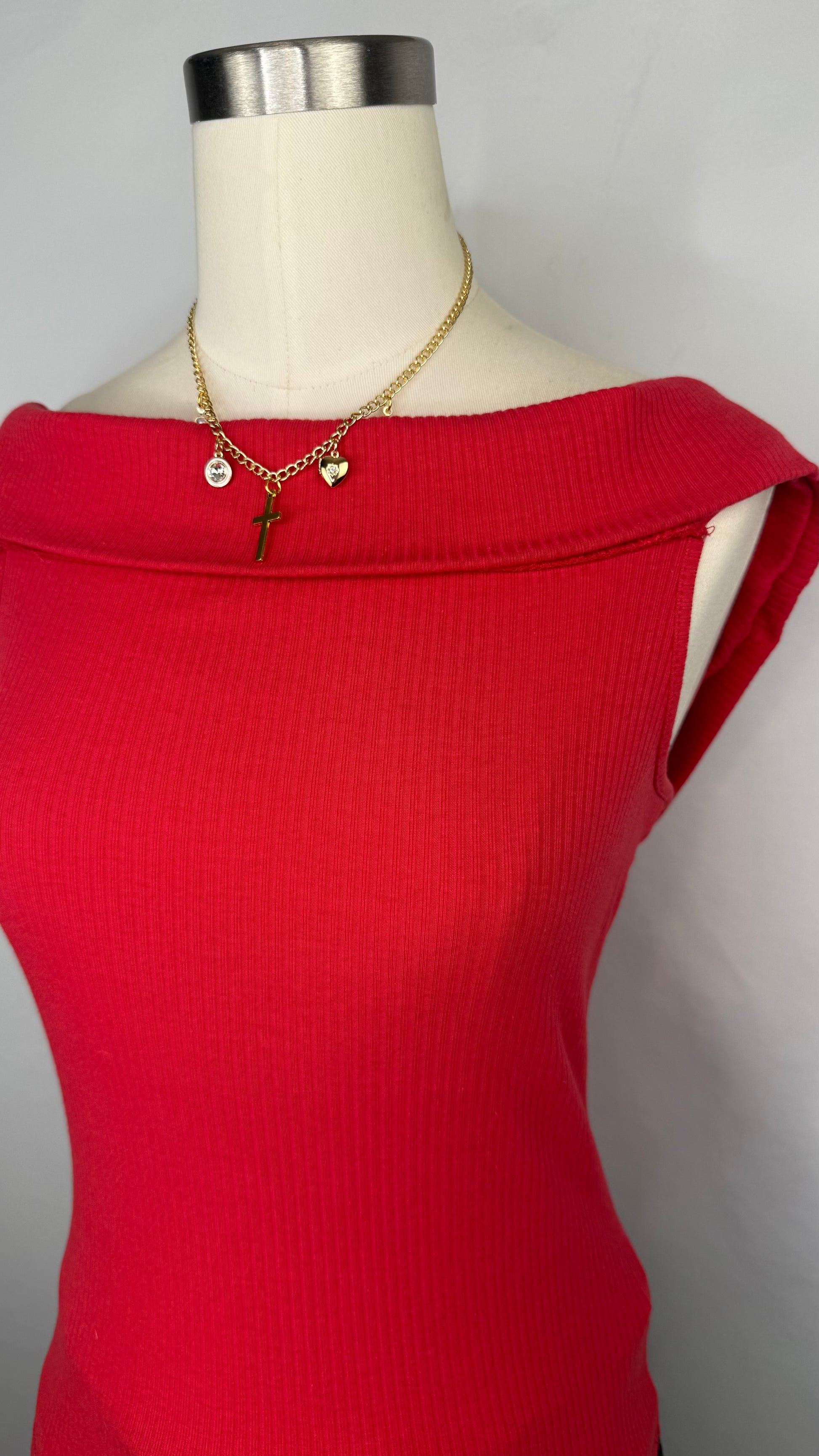 Up-close front facing view of Old Navy Off the shoulder Ribbed Top in red. 