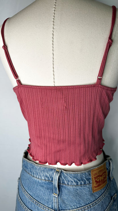 Back view of Urban Outfitters Ribbed Twist Front Cami Top in Pink featuring the adjustable spaghetti straps 