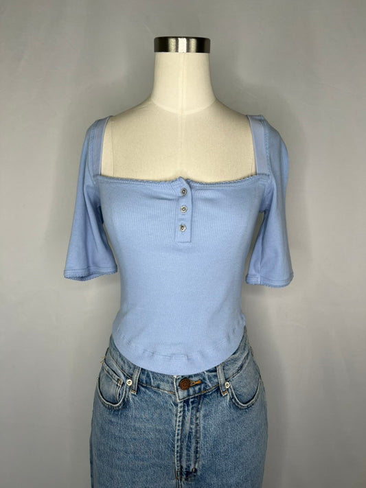 Front view of Urban Outfitters Square Neck Crop Top in Light Blue shown on a mannequin wearing light blue jeans.